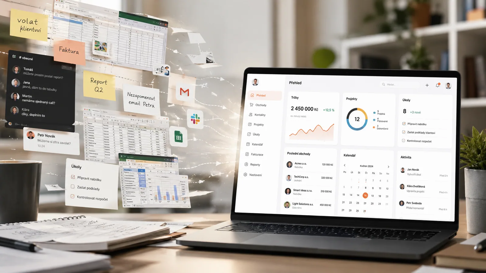 Izometrický pohled na pracovní stůl firmy s notebookem zobrazujícím firemní dashboard, dokumenty a tablet — aplikace na míru jako systém místo chaosu.